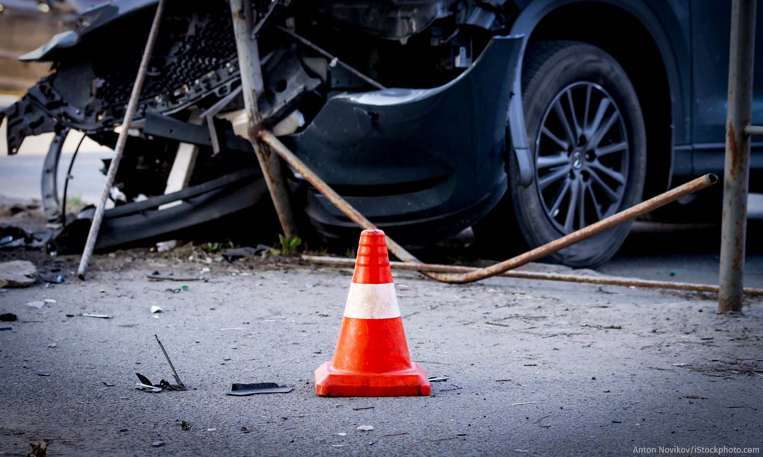 Accident scene with traffic cone highlighting the critical importance of safety measures